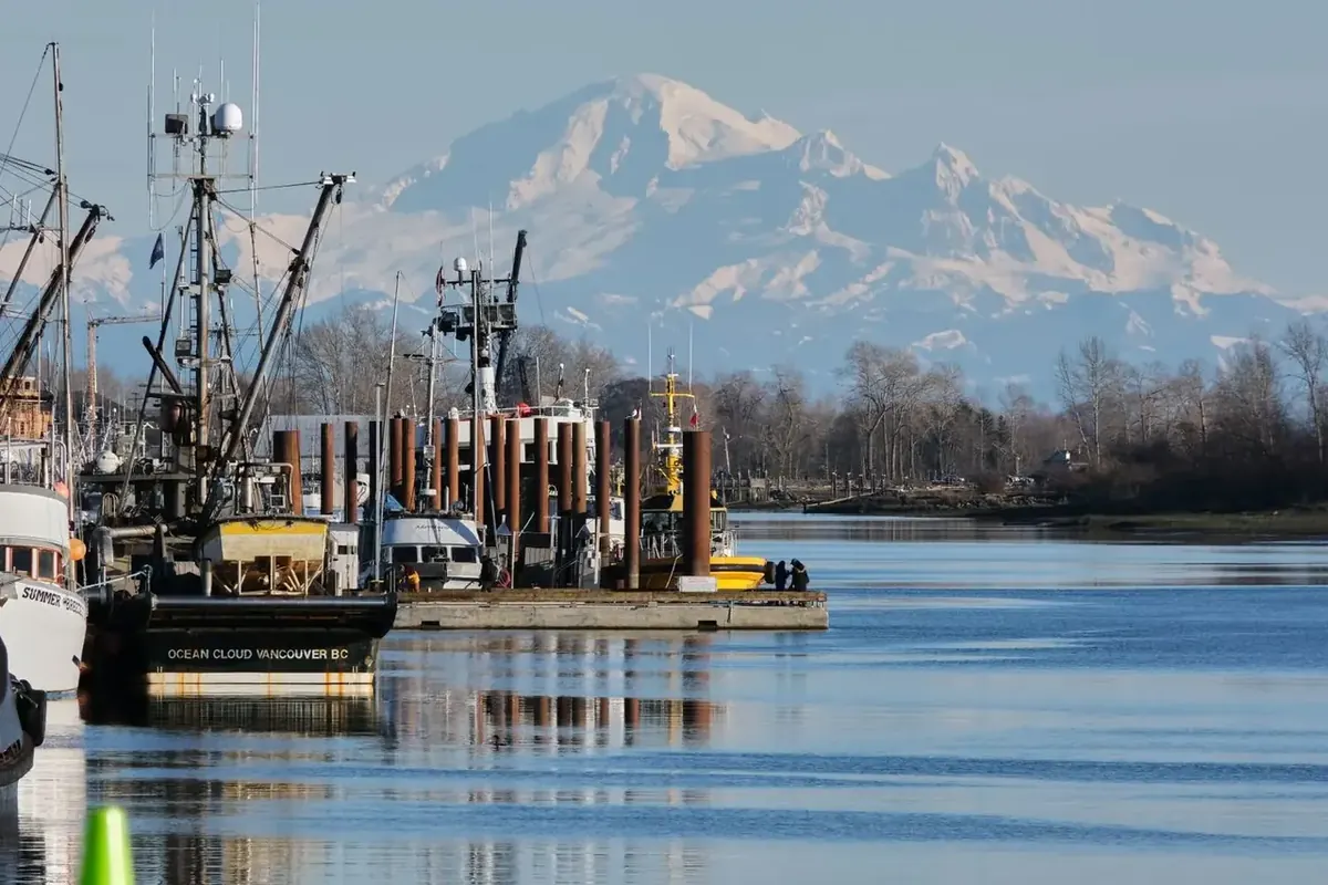 Working waterfront with mountain backdrop