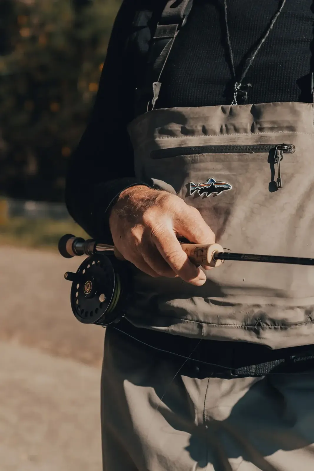 Angler preparing fishing equipment